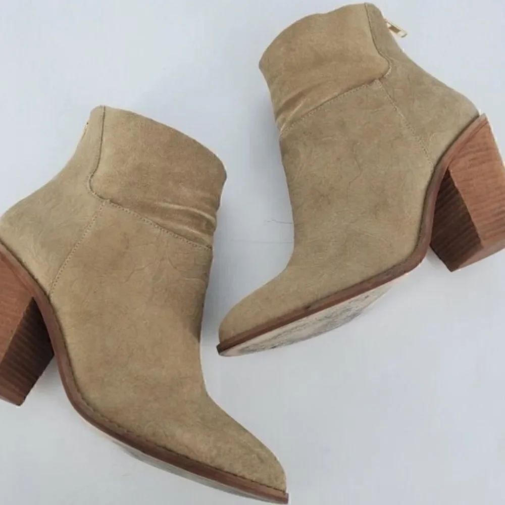 Anthropologie embossed leather ankle boots